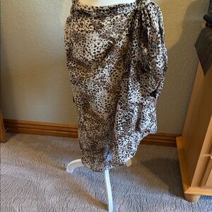 Two pareos bought in Mexico with shell tie included.  EUC